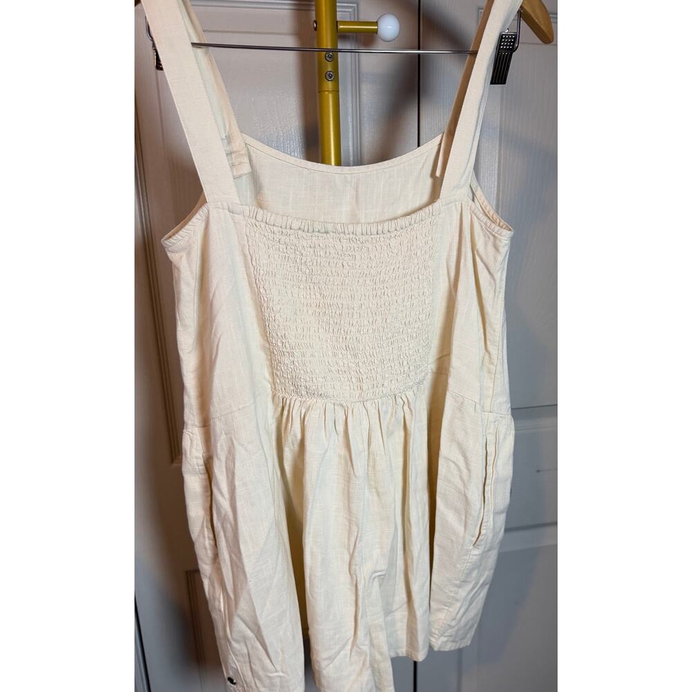 Channel breezy, summery style in this sleeveless romper - Picture 9 of 11